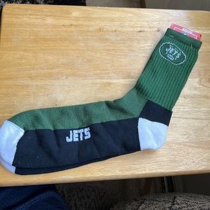 NFL extra large green, black and white socks